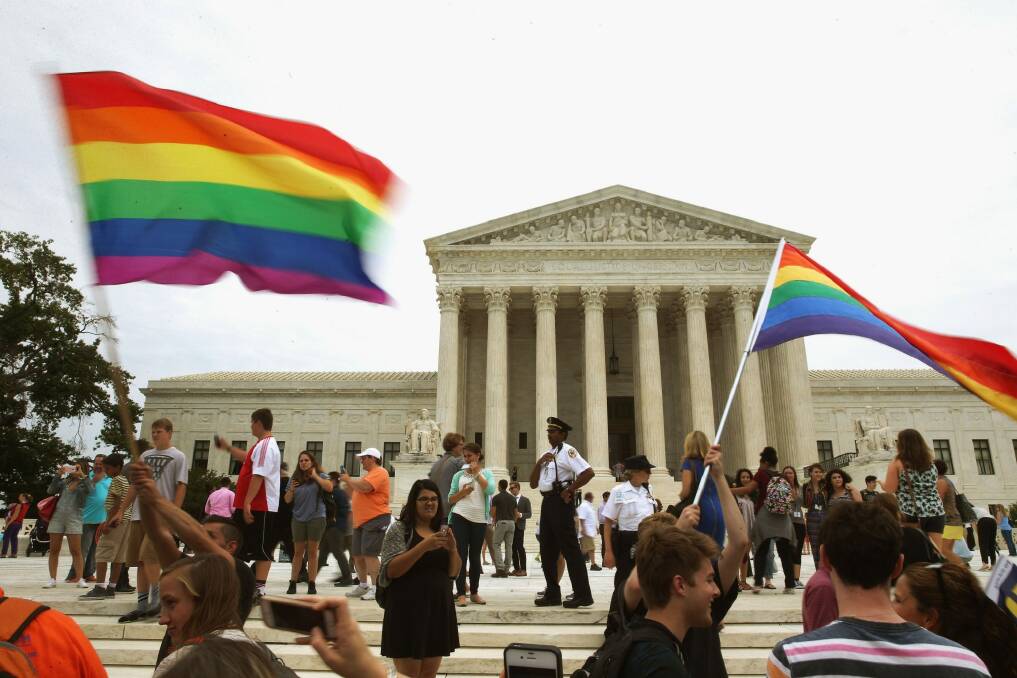 Supporters of marriage equality gather in front of the US Supreme Court, which ruled on Friday that same-sex couples have the right to marry in all states. Photo: Getty Images