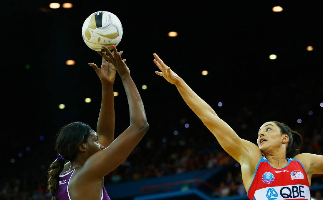 Back in town:  Sharni Layton (right) in her time with the Swifts. Photo: Getty Images