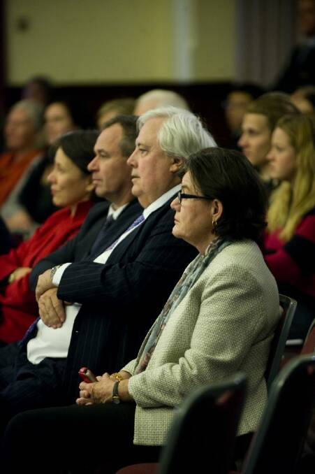 Cathy McGowan and Clive Palmer watch. 