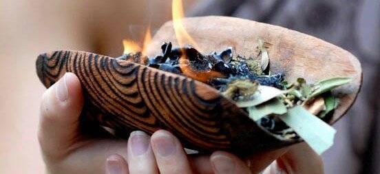 A smoking coolamon of lemon myrtle, aniseed myrtle, paperbark and a native lichen at Jindii Day Spa. Photo: Supplied