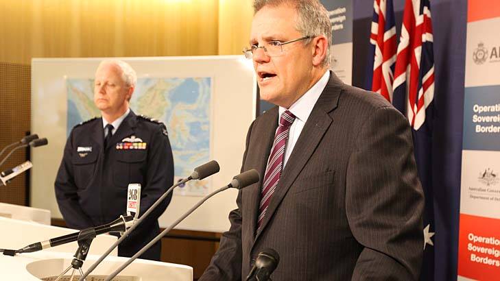 Immigration Minister Scott Morrison and Operation Sovereign Borders acting commander, Air Marshal Mark Binskin, attend the weekly update in Sydney. Photo: Peter Rae