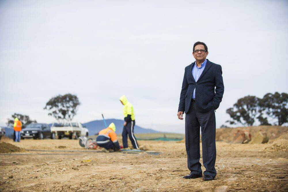 Vice president of the Canberra Muslim Community, Tanveer Khan, at the site of the Gungahlin Mosque in July last year. Photo: Rohan Thomson