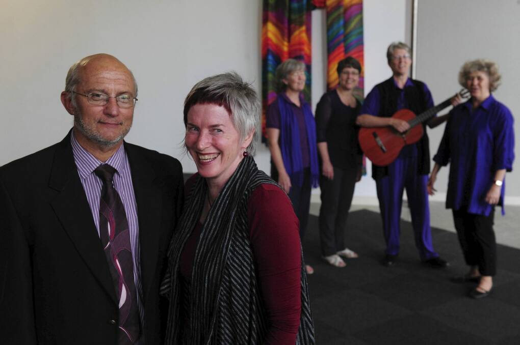 Planning an exhibition of artworks by asylum seekers are Reverend Susanna Pain, right foreground and Professor Stephen Pickard. In support are members of A Chorus of Women Shirley Campbell, Janet Salisbury, Meg Rigby and Johanna McBride at the Australian Centre for Christianity and Culture in Barton.  Photo: Graham Tidy