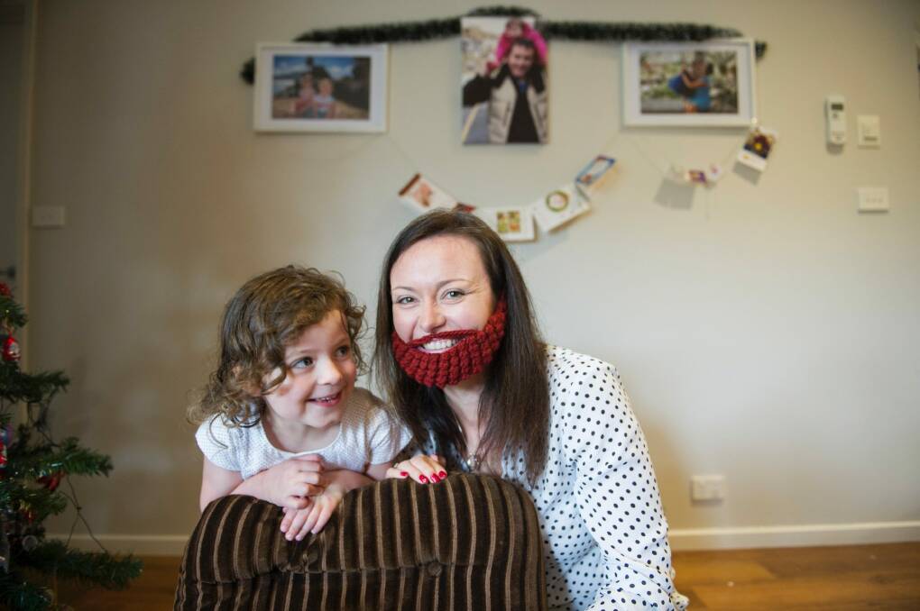 Jocelyn Williams with her daughter, Elke, 4. Jocelyn's husband Michael died from bowel cancer aged 32. The family is raising awareness of the disease. Photo: Jay Cronan
