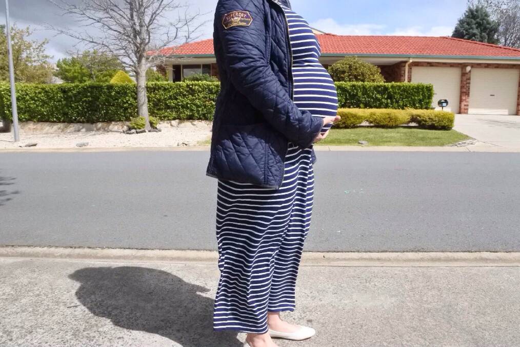 Cristina Wright, who is eight months pregnant, has welcomed an apology after she was refused use of a staff toilet at a Belconnen retailer. Photo: Matthew Raggatt