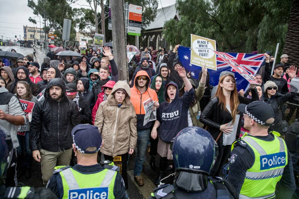 A mass police presence tried to keep apart right and left-wing political groups in Coburg for the rally on Saturday. Photo: Mathew Lynn