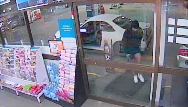 A man armed with a knife attempted to rob a service station in Kaleen, but was thwarted by a locked door.  Photo: Supplied