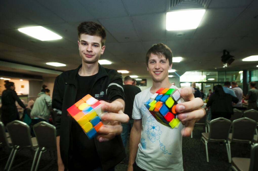 Jayden McNeill and Feliks Zemdegs Rubicks at the Canberra Speed Cubing event. Photo: Dion Georgopoulos