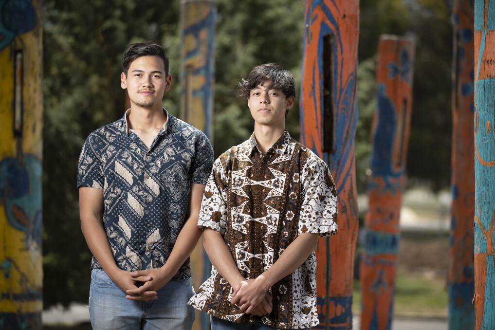Narrabundah College students Joseph Armstrong and Aidan Brooke are worried their ATARs and future plans will be jeopardised if Indonesian is cut from their studies. Photo: Sitthixay Ditthavong