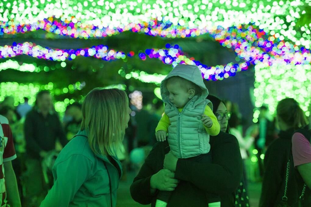 Kathy O'Neil and Veda Stewart, 10 months inside the light display. Photo: Jay Cronan