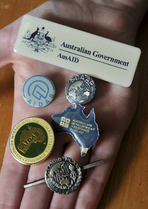 Badges from the
collection of AusAid ephemera.  Photo: Graham Tidy