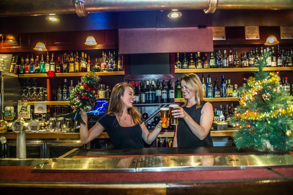 Barmaid Lydia Corcoran and manager Emma Wight are preparing for the biggest night of the year at the Kingston Hotel. Photo: Karleen Minney