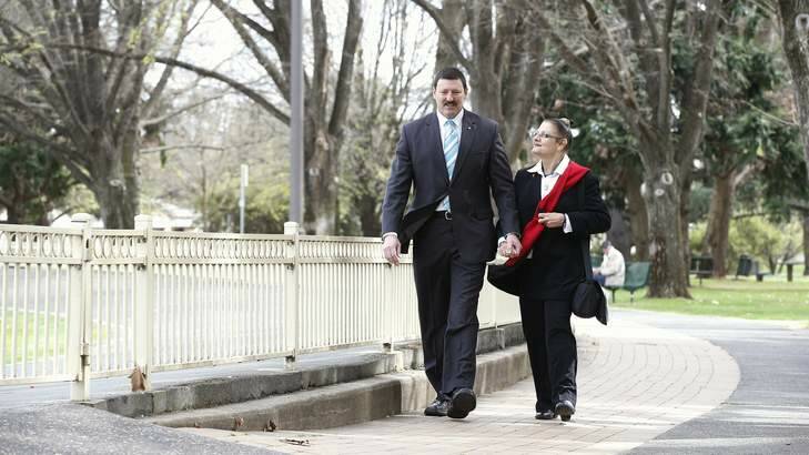 Former member for Eden Monaro Mike Kelly with his wife Rachelle Sakker-Kelly  after announcing his defeat to the Federal Election at Queanbeyan Park. Photo: Jeffrey Chan