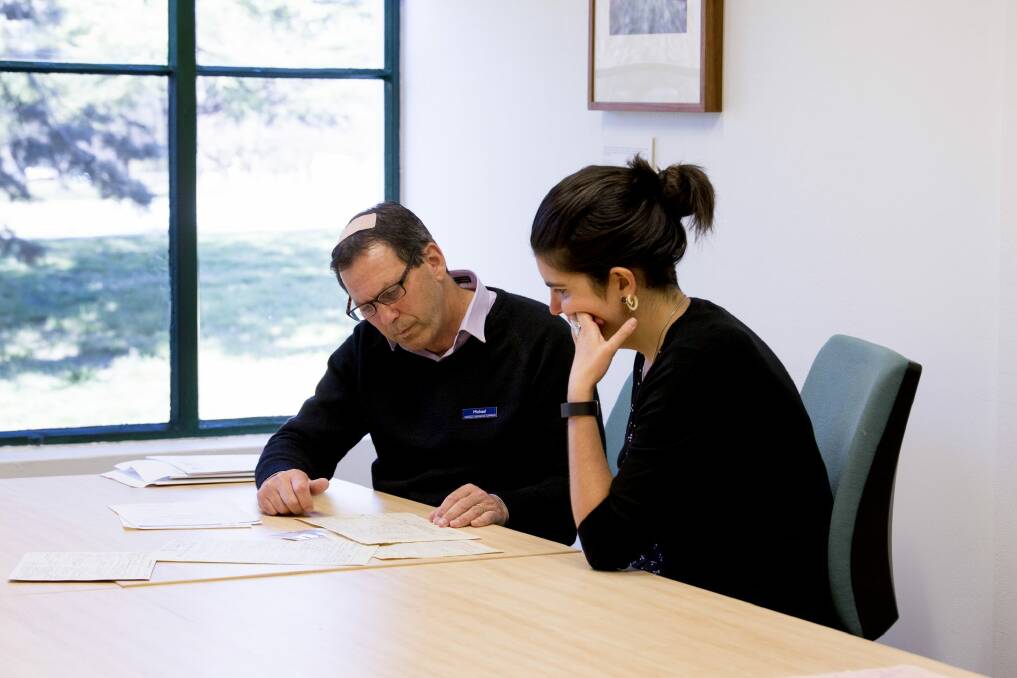 Clare Colley and reference officer Michael Wenke try to piece together her family history. Photo: Anita Entriken