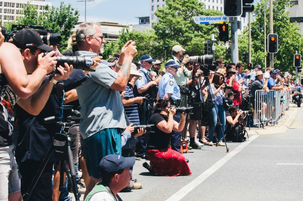 The crowd on Northbourne watches on as the Summernats City Cruise passes the Sydney Building. Photo: Rohan Thomson