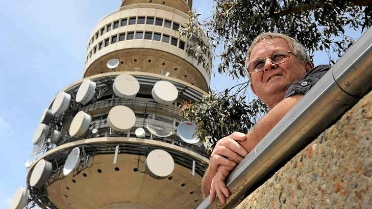 At the base of Black Mountain Tower, former steel rigger, 67-year-old Dave Cavill of Gilmore, helped build many of Canberra's icons and the tower was his favourite project. Photo: Graham Tidy
