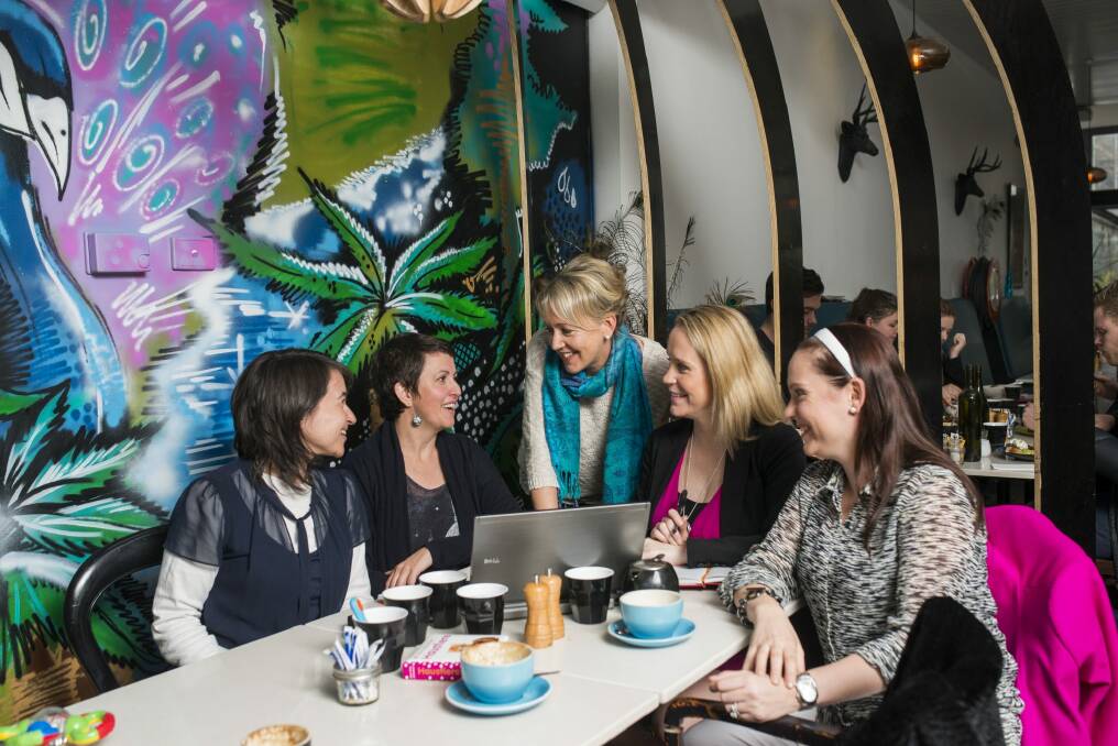 Tanja Meyerhofer, Amy Lees, Tanya Dannock, Vanessa Vanderhoek and Maree Gill during a meeting to discuss returning to work after caring for children. Photo: Rohan Thomson
