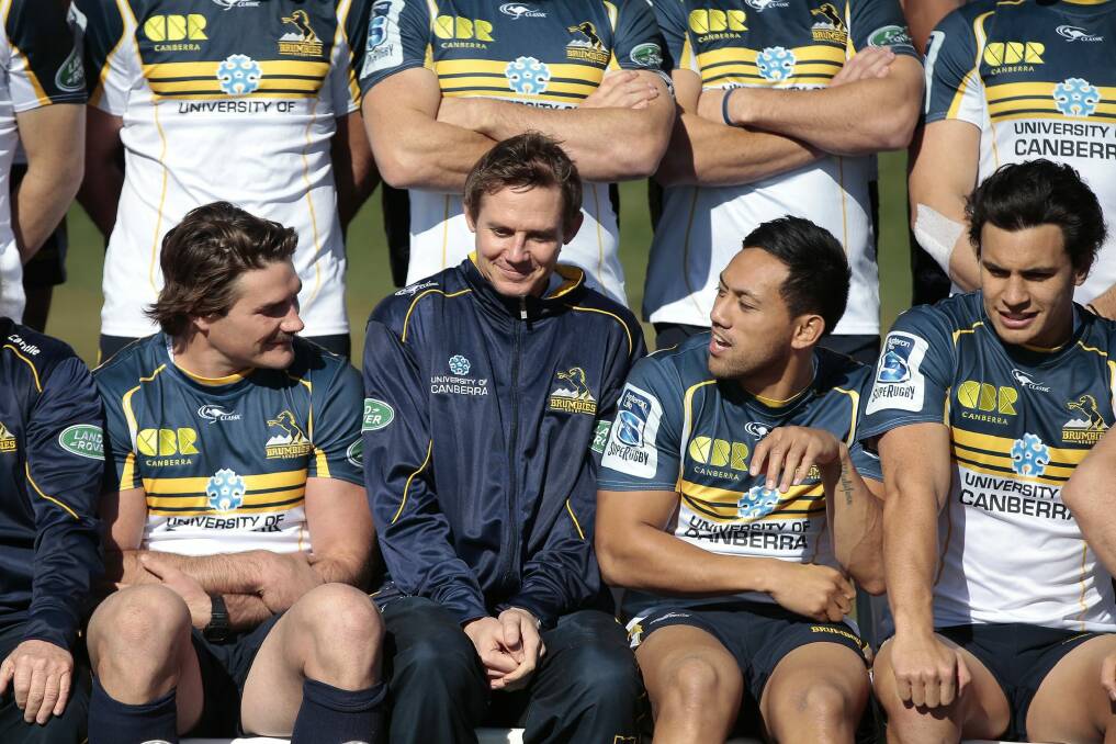 Brumbies coach Stephen Larkham is trying to beat cashed-up French clubs to keep his stars