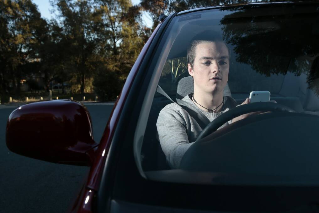 Six times as many people were caught talking on the phone while driving than messaging or using social media behind the wheel on ACT roads in the past nine months. Photo: Jeffrey Chan