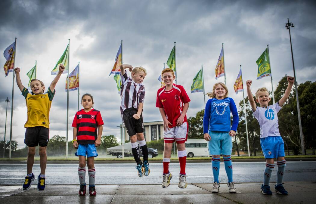 The flags have been raised along Commonwealth Avenue in celebration for the upcoming Asian Cup. These excited kids (From left), Will Davis 7, Kaitlyn Colwill 8, Josh Heddith 10, Daniel Findlay 9, Eloise Jamet 9, and Lucas Carey 6, will experience the passion.

The Canberra Times.
 Photo: Jamila Toderas