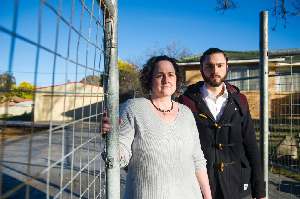 Kelly Marshall and Sam Carlini say rates on their Mr Fluffy costs $111 a week. Photo: Dion Georgopoulos