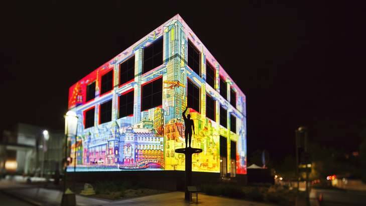 The Electric Canvas projects original artworks onto Questacon during Enlighten Canberra 2013.