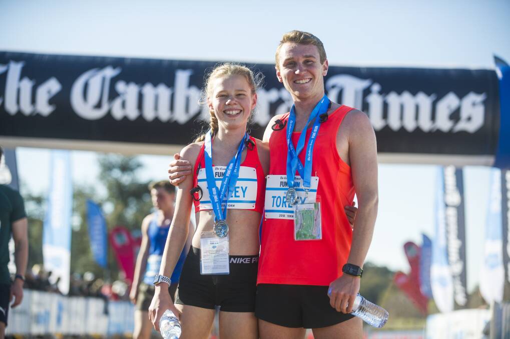 Canberra Times Fun Run 2018. Women's and Men's 1st place in the 10km run siblings Stephanie Torley and Josh Torley. Photo: Dion Georgopoulos