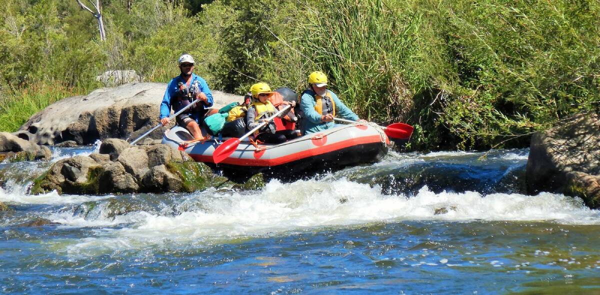 The raft laden with our camping gear negotiates a short stretch of white water.  Photo: Tim the Yowie Man