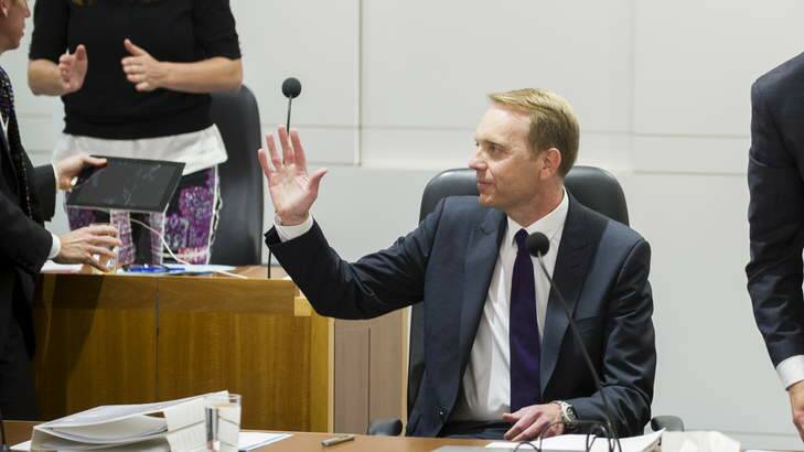 Simon Corbell acknowledges a standing ovation from the public gallery after introducing the Marriage Equality Bill in the ACT Legislative of Assembly. Photo: Rohan Thomson