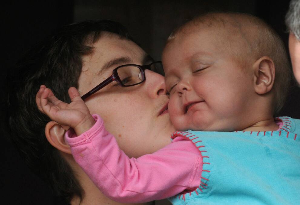 Rachel with baby Cordelia, just months after her transplant. Before the operation 'we just took it a day at a time', Rachel says. Photo: Karleen Minney