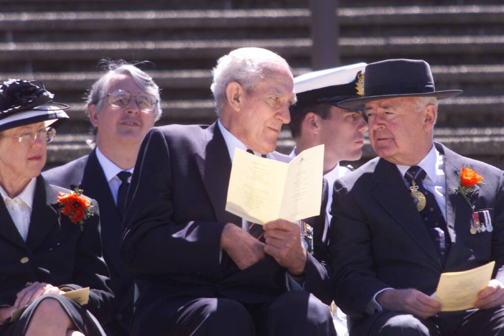 Former chair of the Australian War Memorial Major-General  William  'Digger' James (CENTRE) and the Governor-General Sir William Deane and Lady Deane during the 2000 Remembrance Day ceremony.  Photo: Paul Harris