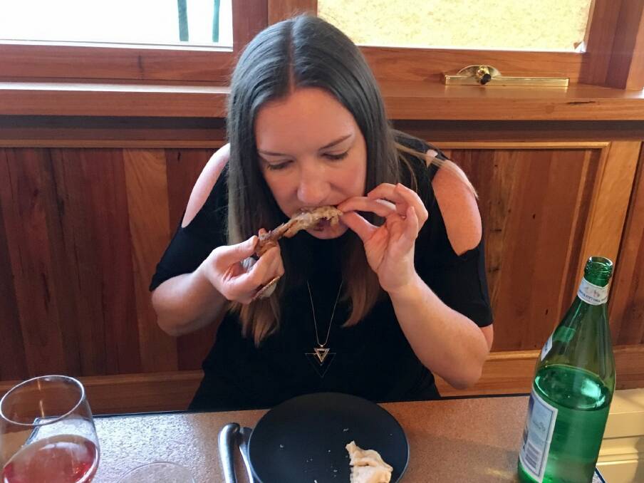 Jil Hogan trying the chicken feet at the Blood n Bones Offal and Offcuts dinner at Cupping Room. Photo: Scott Kompo-Harms