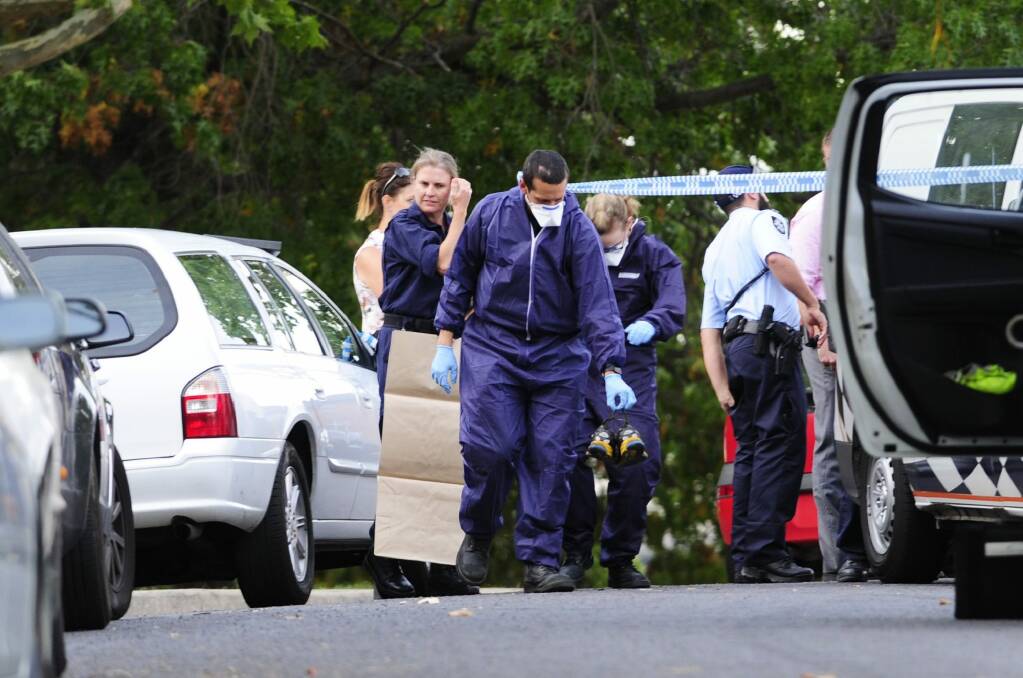 Police investigate the suspicious death at the Stuart Flats in Griffith in February last year.  Photo: Melissa Adams 