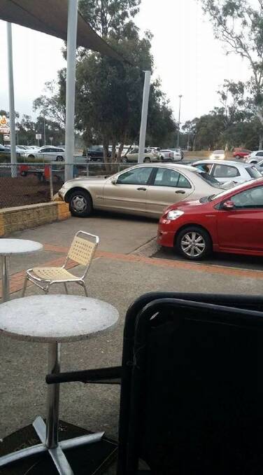 It's alleged one of the cars was pushed into the wall of a playground. Photo: Facebook