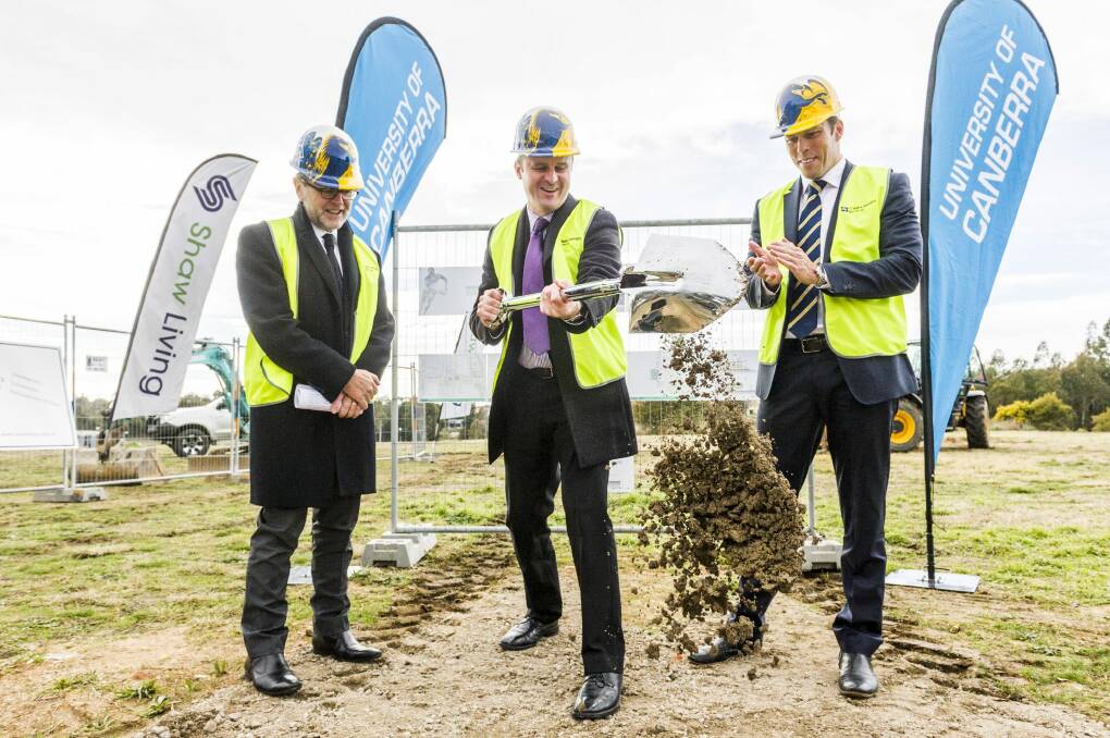 Happier times: There's a rift between the Brumbies and University of Canberra two years after construction started on a new rugby base at UC. UC Vice-Chancellor Professor Stephen Parker, left, with Chief Minister Andrew Barr, centre, and former Brumbies boss Andrew Fagan. Photo: Rohan Thomson