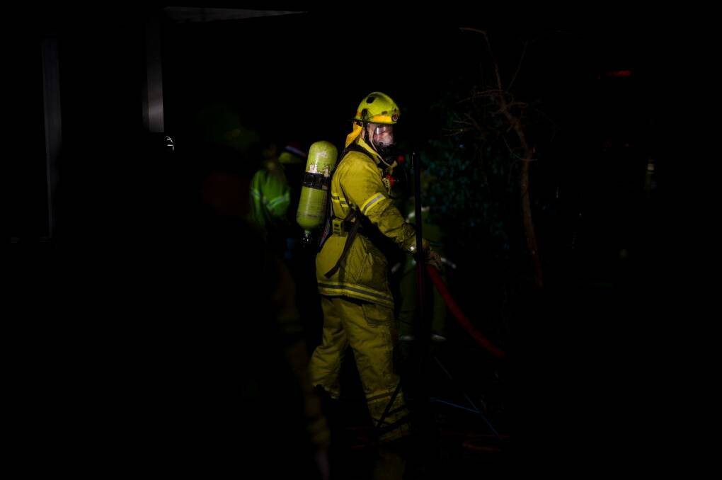 Guests in 35 rooms of a south Canberra hotel were evacuated on Saturday night because of a fire in a laundry. Photo: Jay Cronan