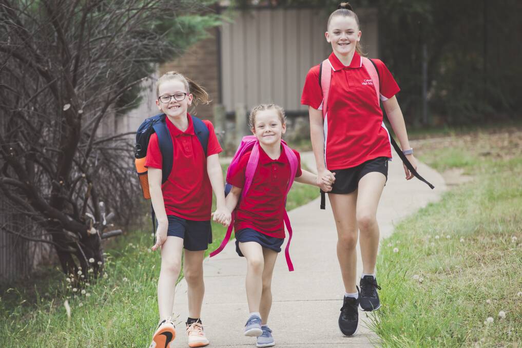 Keira James (right), who is heading into Year 7 this year, pictured with two of her three sisters Ashlyn, 9 (left) and Bronte, 8.
 Photo:  Jamila Toderas