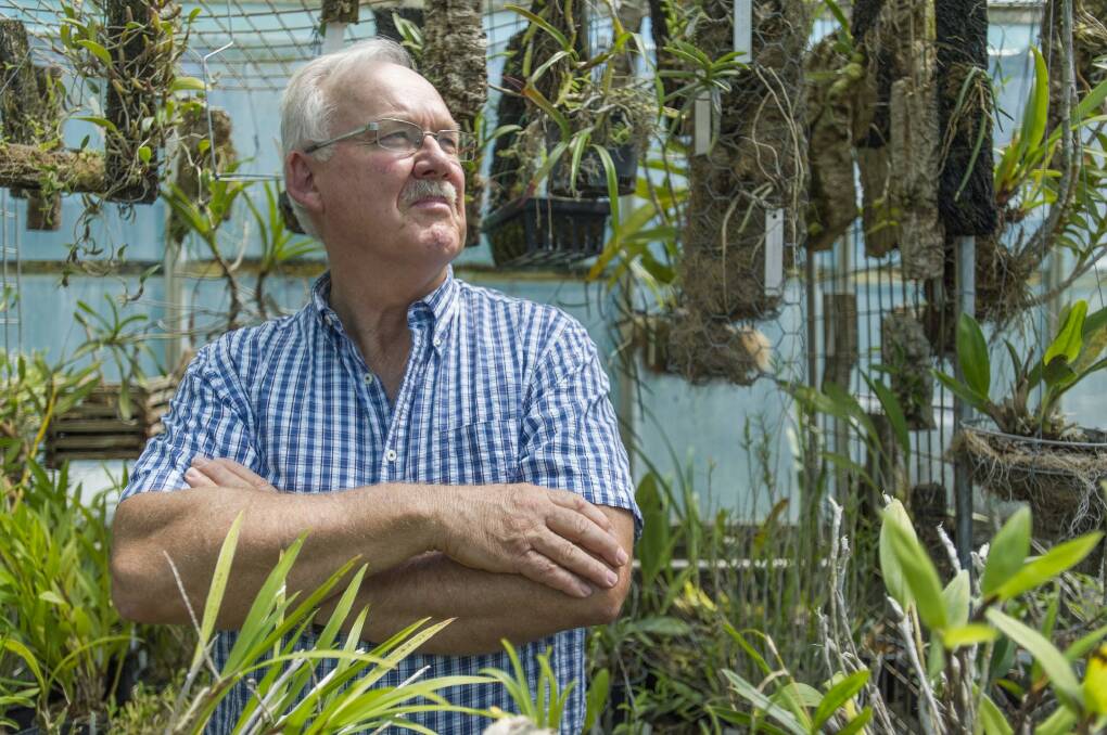 Dr Mark Clements in one of his greenhouses. Photo: Jay Cronan