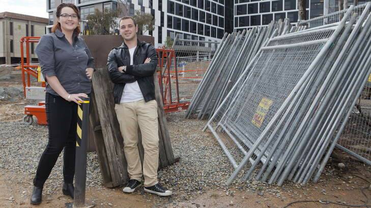 Mitchell Harmer and Alexandria Garlan were part of a team of four ACT students who have designed a construction site app. Photo: Supplied