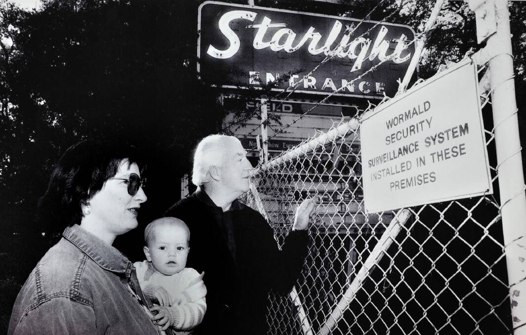 Julie Smith with baby Roan and  Stan Cronan at the old Starlight drive-in in 1997. Photo: Paul Harris