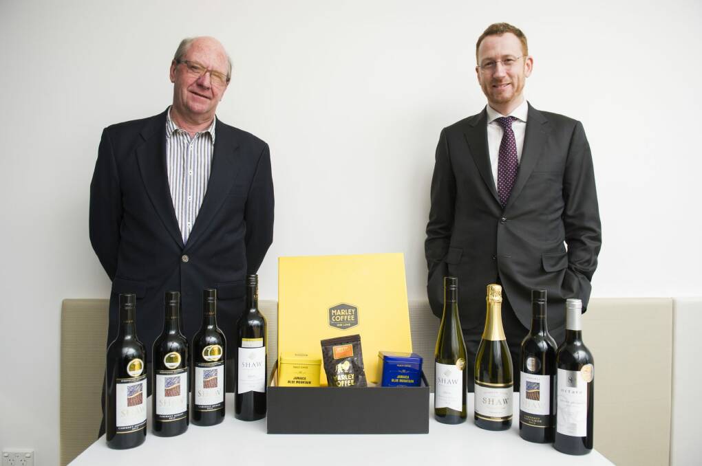 Shaw Vineyard Estate director Graeme Shaw, and the Australian Trade Commission's Brett Cooper with Shaw wine and Marley Coffee. 
 Photo: Rohan Thomson