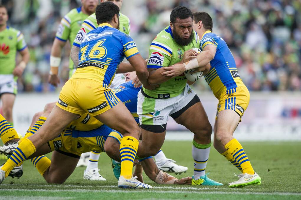 The Raiders' Junior 
Paulo pushes through against the Eels but faces a nervous wait on scan results. Photo: Jay Cronan