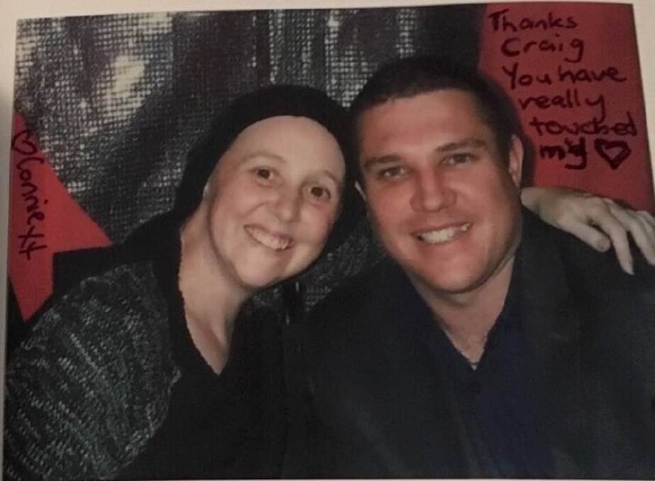 Connie Johnson wrote a special message on a selfie of her and Canberra man and cancer survivor Craig Glover who promised her he would raise $100,000 for Love Your Sister. Photo: supplied