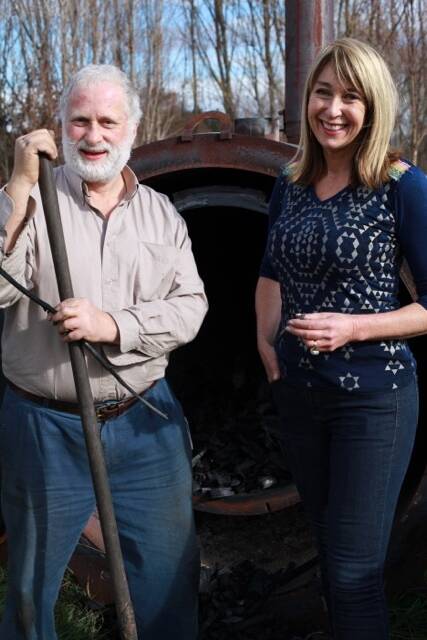 Peter Marshall with wife Kate Marshall and their biochar maker. Photo: Supplied