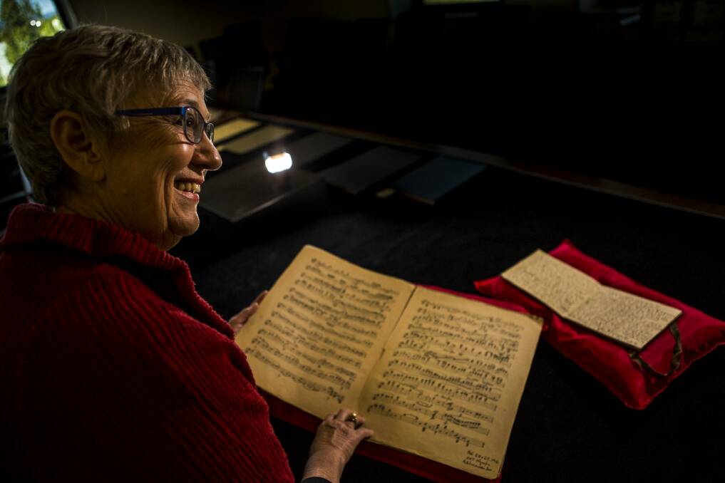 Senior curator at the National Library of Australia Robyn Holme with the original manuscript of the 'lost' Gallipoli sonata by Frederick Septimus Kelly. Photo: Jamila Toderas