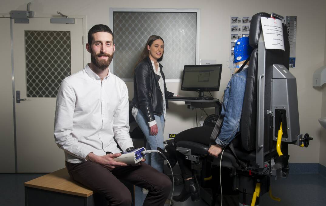 Dr Andrew Flood and honours students Jane Hunt and Rebecca Byrne have been testing how electric brain stimulation can increase endurance. Photo: Elesa Kurtz
