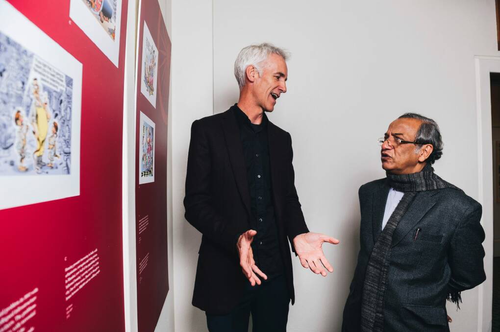 David Pope with Indian artist Ajit Ninan, cartoonist to the world's largest democracy, at Ninan's 2016 exhibition at the Museum of Australian Democracy at Old Parliament House in Canberra. Photo: Rohan Thomson
