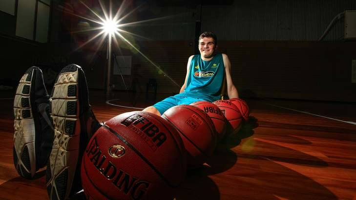 16-year-old basketballer Isaac Humphries is 2.13m tall and has legs the length of 6 basketballs in a line. Isaac is at the AIS as part of an Australian development camp and has moved to Canberra from Sydney as part of the Basketball Australia centre of excellence. Photo: Katherine Griffiths
