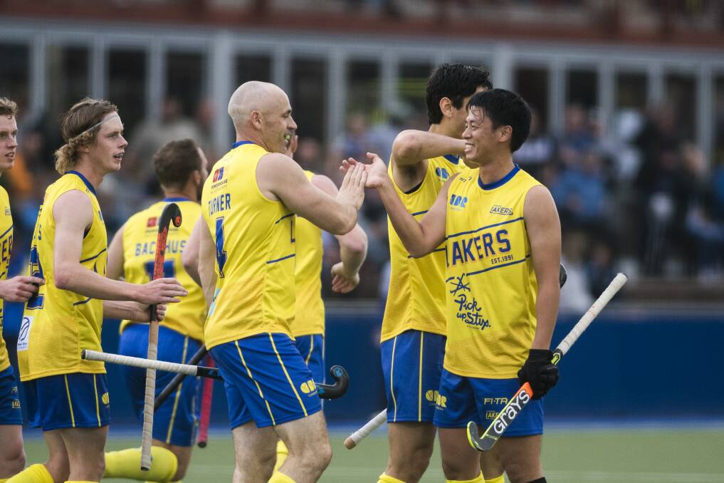 Glenn Turner celebrates with his team after scoring the first goal. Photo: Dion Georgopoulos