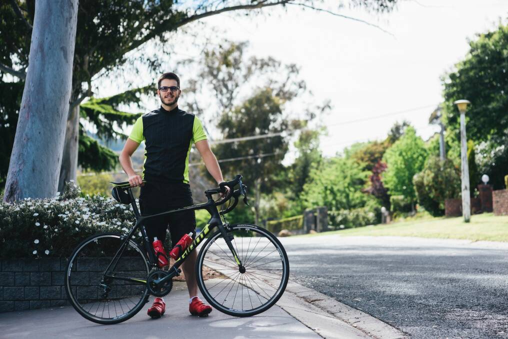 Harry Bates is riding 3000km around Canberra raise money to support research into retinitis pigmentosa, a degenerative eye disease which he lives with. Photo: Rohan Thomson